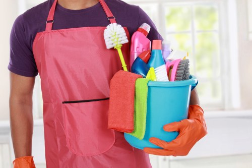 Office cleaner maintaining a professional workspace in Nottinghill
