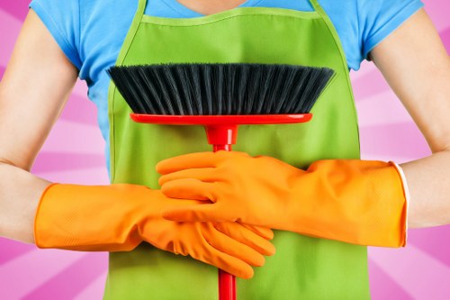 Cleaning shared office kitchen and communal surfaces in a Nottinghill workplace
