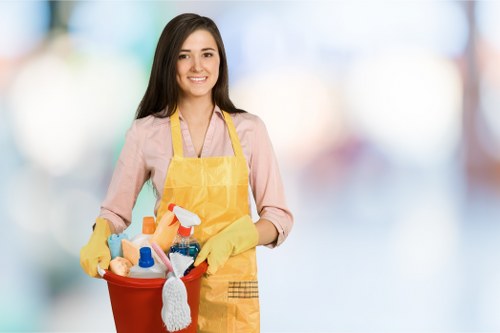 Professional cleaner working in a Notting Hill mixed-use building